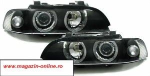 Vand 	 Faruri BMW E39 seria 5 cu lupa si angel eyes fundal negru